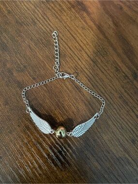 Silver Winged Bracelet with Gold Accent Bead - Women Jewelry